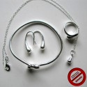 Parure goutte : Boucles d'oreilles, bague, bracelet et collier (Attention produit non artisanal)