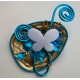 Broche papillon turquoise et or