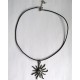 Collier avec pendentif soleil fimo noire et blanche