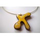 Collier "bonhomme" jaune avec feuille d'argent