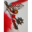 Bijou de sac pompon rouge