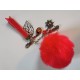 Bijou de sac pompon rouge