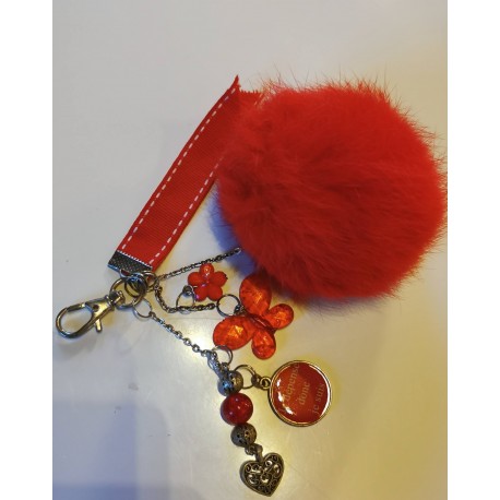 Bijou de sac "pompon fuchsia"