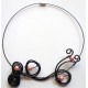 Collier noir à perles corail