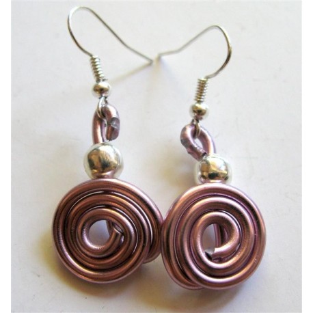 Boucles d'oreilles tortillon rose